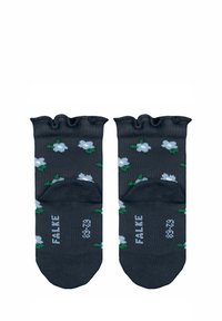 Schwarze Knöchelsocken mit einem Rüschensaum, die ein florales Muster aus weißen Blumen und grünen Blättern aufweisen. Die Sohle ist mit der Zahl "8" bedruckt.