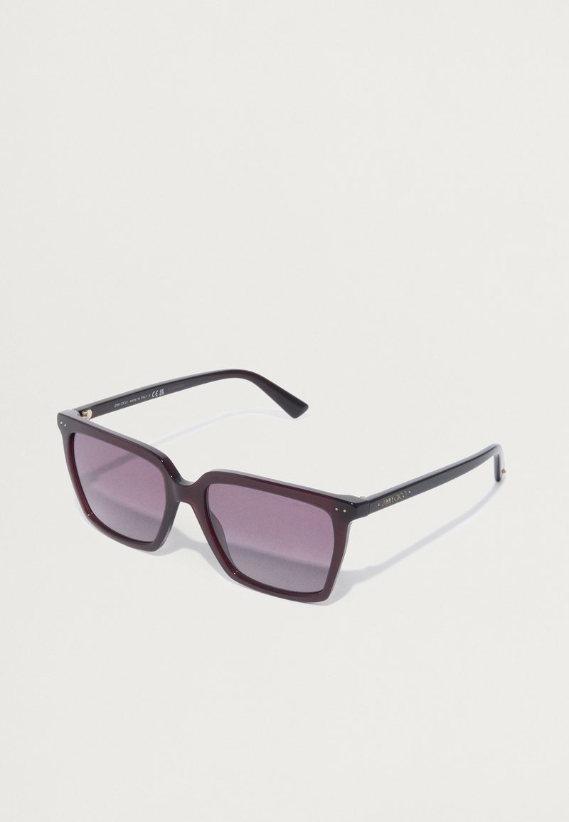 Square sunglasses with dark burgundy plastic frames and gradient purple lenses. Gold accents on the temples enhance the design.