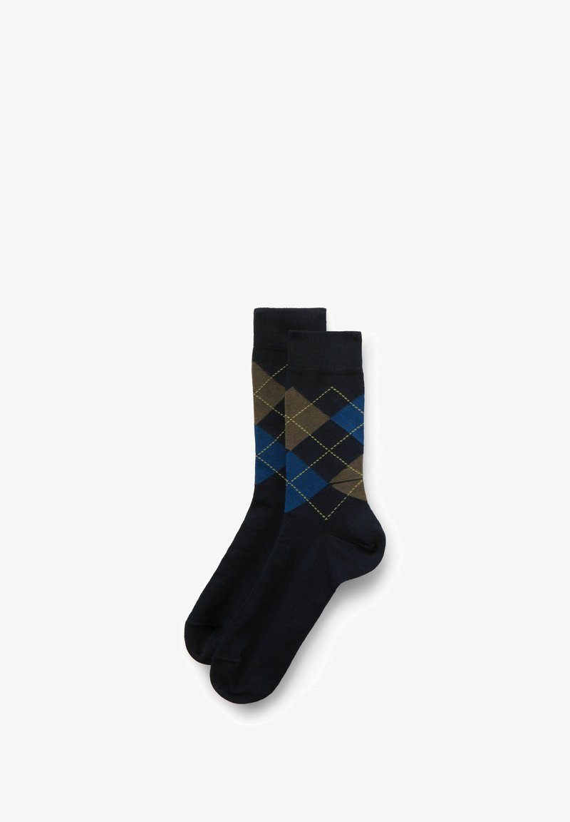 Mørkeblå sokker med et argyle mønster bestående af mørkeblå, brune og grønne diamanter, fremstillet af blødt og strækbart materiale.