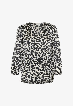 Bluzka w panterkę w czerni i kremie, z dekoltem w serek, długimi rękawami z marszczeniami na ramionach oraz luźnym krojem. Miękka tekstura.