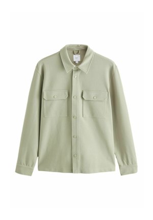 Light green button-up shirt jacket with two front flap pockets and long sleeves, displayed on a white background.