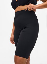 Pantaloni shapewear neri a vita alta, realizzati in materiale liscio ed elastico. Presentano un design senza cuciture e una lunghezza fino a metà coscia.