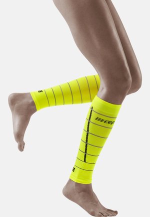 THE RUN COMPRESSION REFLECTIVE CALF SLEEVES WOMEN - MADE IN GERMANY  - Beenwarmer - neon yellow