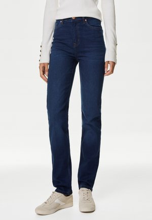 Dunkelblaue Jeans aus Denim mit geradem Schnitt, hoher Taille und klassischem Fünf-Taschen-Stil. Mit dezentem orangefarbenem Stich und Kupferknöpfen.