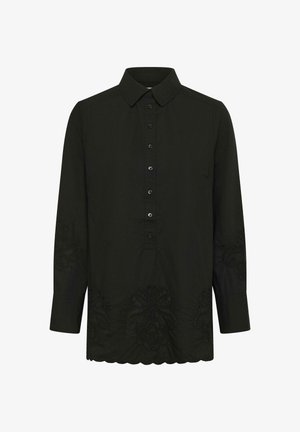 Blouse noire à manches longues avec boutons sur le devant, col, ourlet festonné et motifs floraux brodés subtils sur les manches et le bas.