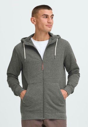 Gray zip-up hoodie with adjustable drawstring hood, two front pockets, ribbed cuffs, and faux leather zipper pull accent.
