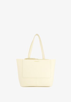 Stor, cremefarvet læder tote-bag med dobbelte håndtag, lynlåslukning og et frontpanel med præget brandlogo.