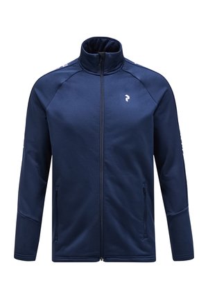 Giacca zip-up blu navy con colletto alto, realizzata in tessuto liscio, dotata di due tasche frontali e di un logo sul lato sinistro del petto.