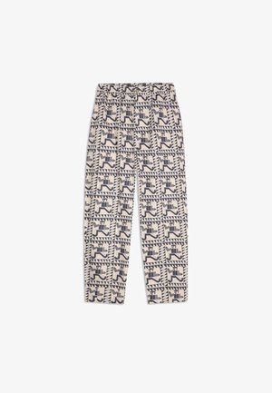 Pantalons beiges avec taille élastique, fermeture à bouton et motif géométrique noir présentant des silhouettes stylisées de coureurs dans des carrés.
