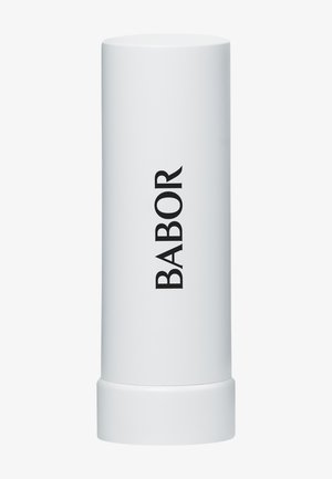 White cylindrical container with a matte finish, featuring black text that reads "BABOR." Smooth texture, no visible patterns or accents.