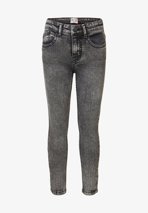 Jeans pitillo negros lavados con cierre delantero de botones y cremallera, diseño de cinco bolsillos y trabillas para cinturón.