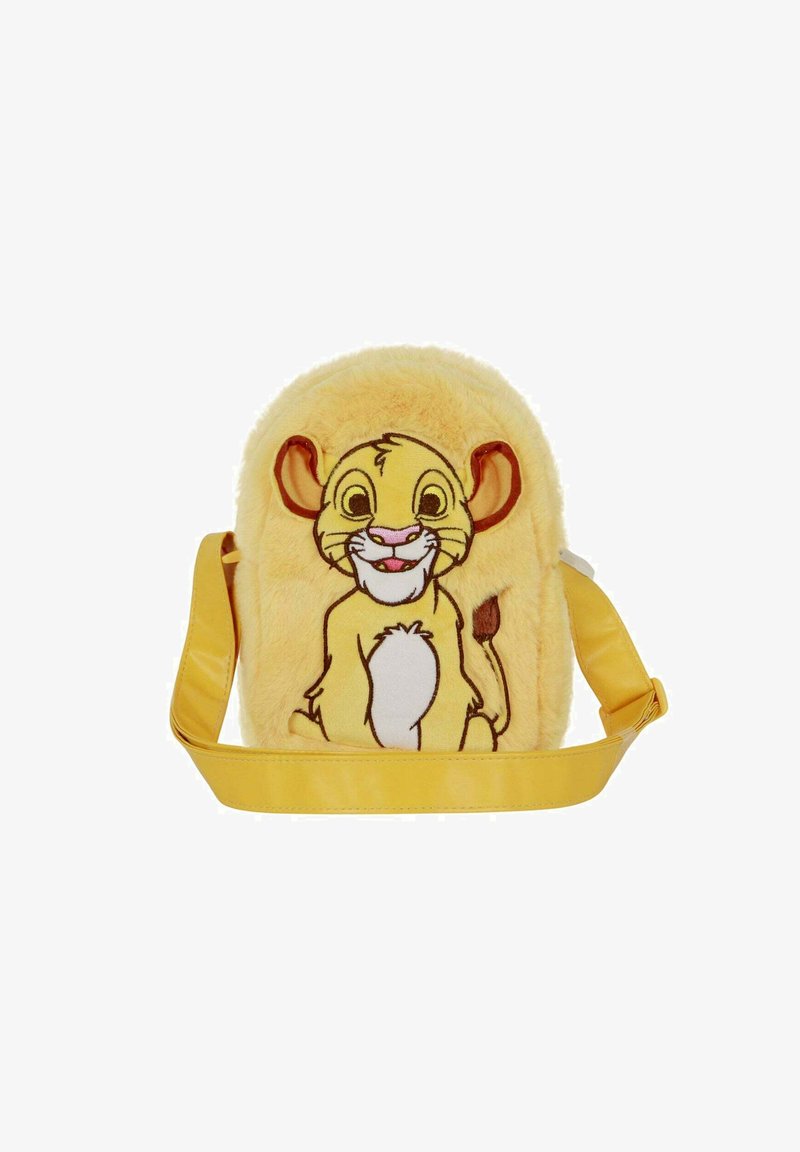 Sac à dos en peluche douce de couleur jaune, présentant un personnage de lion brodé. Il dispose d'une sangle jaune et d'une forme arrondie avec une texture duveteuse.