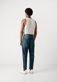 Scotch & Soda DEAN LOOSE TAPERED - Jean boyfriend - green touch