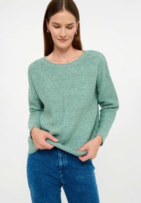 Unselected, mint