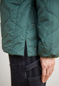 Nike Sportswear Übergangsjacke - vintage green
