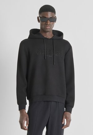RELAXED FIT - Jersey con capucha - black