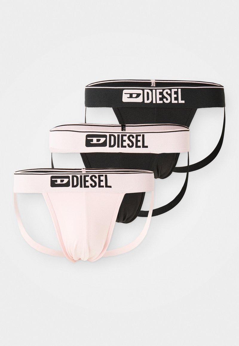 Três pares de roupa interior Diesel com um esquema de cores em rosa e preto. Os cós elásticos apresentam um logótipo e riscas contrastantes.