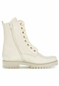 Bottes hauteur cheville en cuir beige avec bout rond, fermeture éclair latérale et lacets en tissu. Dotées d'une semelle extérieure en caoutchouc texturée et de coutures décoratives.