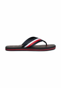 Sort flip-flop med en tekstureret gummisål og en blød stofrem med rød, hvid og blå stribe i midten.