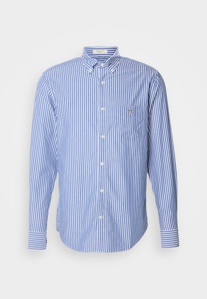 Blue and white striped button-down shirt with long sleeves, a collar, and a left chest pocket. Fabric has a smooth texture.