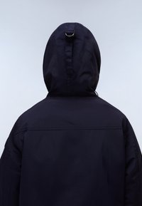 Navy hooded jacket featuring a smooth texture, a cinched neckline, and a back loop detail. The fabric is lightweight and water-resistant.