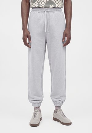 Marimekko OITTI LOGO PLACEMENT KIOSKI UNISEX - Долнище на анцуг - grey melange/off white