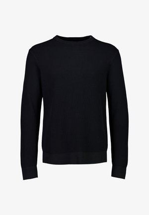 Suéter negro de punto con textura de canalé. Cuello redondo, mangas largas y dobladillo ajustado. Diseño sencillo, confeccionado en una tela suave.