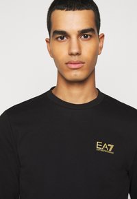 EA7 Emporio Armani Felpa - black / gold