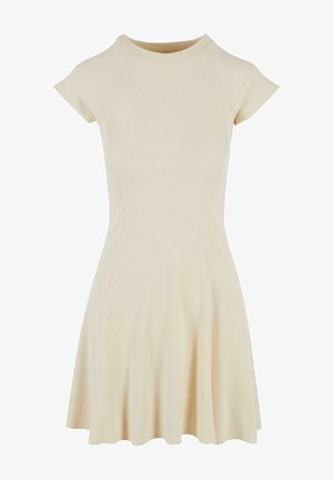 Robe crème côtelée avec un bustier ajusté, des manches raglan courtes et une jupe évasée. Texture lisse et décolleté rond simple.
