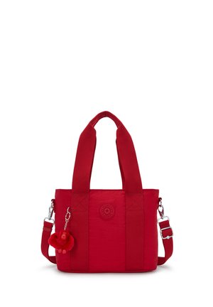 Borsa a mano in nylon rosso con due manici, tracolla regolabile e un piccolo portachiavi a forma di scimmia di peluche attaccato al lato anteriore sinistro.