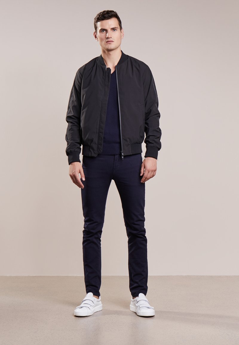 j lindeberg thom gravity bomber