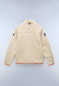 Cream-colored fleece jacket with high collar, long sleeves, and orange trim at the hem. Features a patch on the left shoulder.