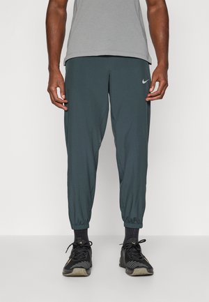 FORM PANT - Joggebukse - seaweed/black/reflective silver-coloured
