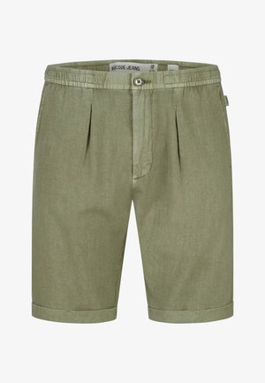 Shorts décontractés vert clair avec bouton et taille élastique, plis avant, ourlets retroussés et poches latérales.