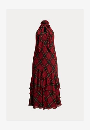 Czerwona sukienka w kratę z dekoltem halter, falbaną na dole oraz zielonymi i żółtymi akcentami, charakteryzująca się luźnym krojem i lekkim materiałem.