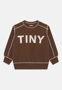 Sweatshirt marron avec "TINY" imprimé en blanc à l'avant. Présente un col et des poignets côtelés, des coutures contrastées et une coupe décontractée.