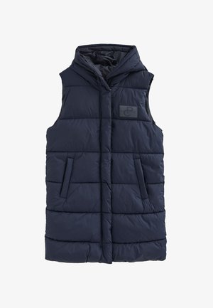 Chaleco acolchado azul marino con capucha, que presenta secciones acolchadas, dos bolsillos laterales y un parche de logo en el frente. Fabricado con un tejido liso e insulated.