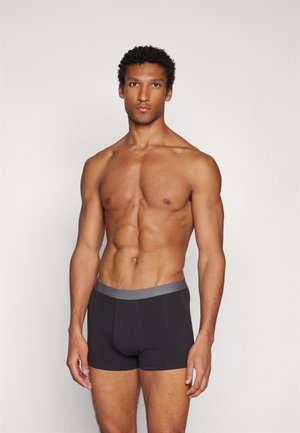 Schwarze Boxer-Shorts mit einem grauen elastischen Bund, aus einem glatten Material gefertigt, mit einer taillierten Passform und ohne sichtbare Muster.