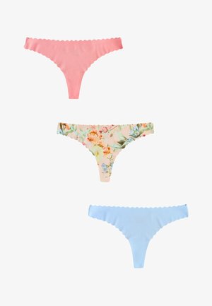 Drei Damen-Strings in Pink, floralem Muster und Hellblau, jeweils mit gewellten Kanten, auf weißem Hintergrund dargestellt.