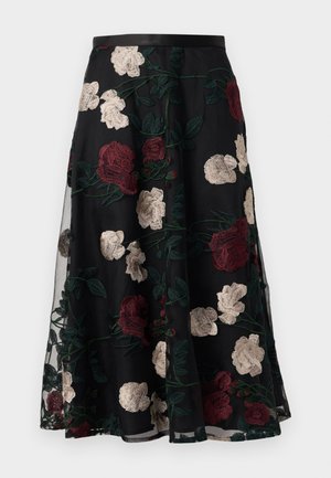 Zwarte rok met bloemenborduursel in rood, wit en groen. Heeft een aansluitende tailleband en een vloeiende A-lijn silhouet.