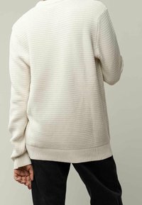 MELA Stickad tröja - beige