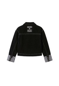 Veste en jean noire avec des poignets gris retroussés et des coutures blanches, avec le texte "CHANGE THE GAME" en haut du dos.