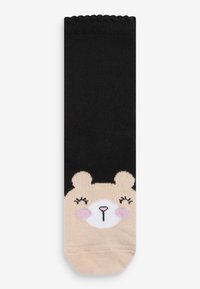 Calzini neri con un design della faccia di un orso beige sulla punta, con dettagli di blush rosa, bordo a coste e materiale morbido e elastico.