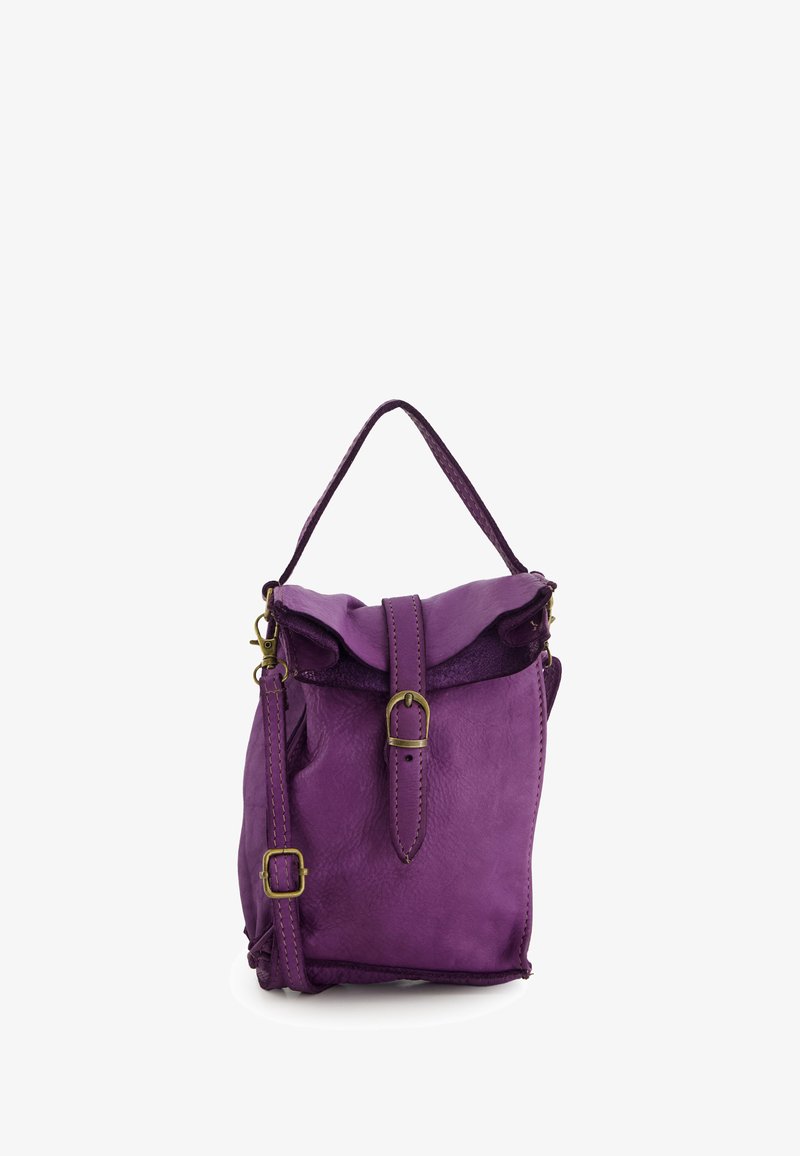 Purple leather handbag with a top handle, adjustable shoulder strap, front flap, and brass buckle closure on a white background.
