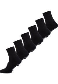Sorte bomuldsankelstrømper med ribbet kant, vist i en række af seks. Har sømløs tå og diskret logodetalje på sålen.