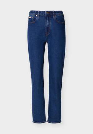 Sötétkék egyenes szabású farmernadrág közepes derékmagassággal, ötlábbal, és kontrasztos narancssárga varrással az egész felületen.