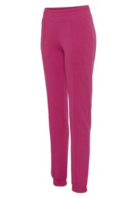 Fuchsia Jogginghosen mit elastischem Bund, zwei Seitentaschen und gerippten Bündchen. Hergestellt aus einem weichen, dehnbaren Stoff mit glatter Textur.