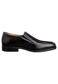 Black leather slip-on shoe with a rounded toe, minimal stitching, textured surface, and a low stacked heel.