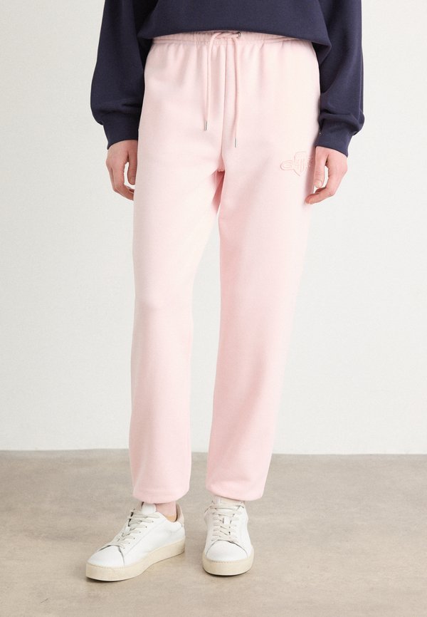 TONAL SHIELD - Tracksuit bottoms - salmon