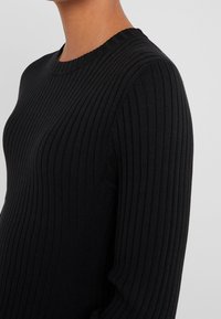 Repeat Abito in maglia - black